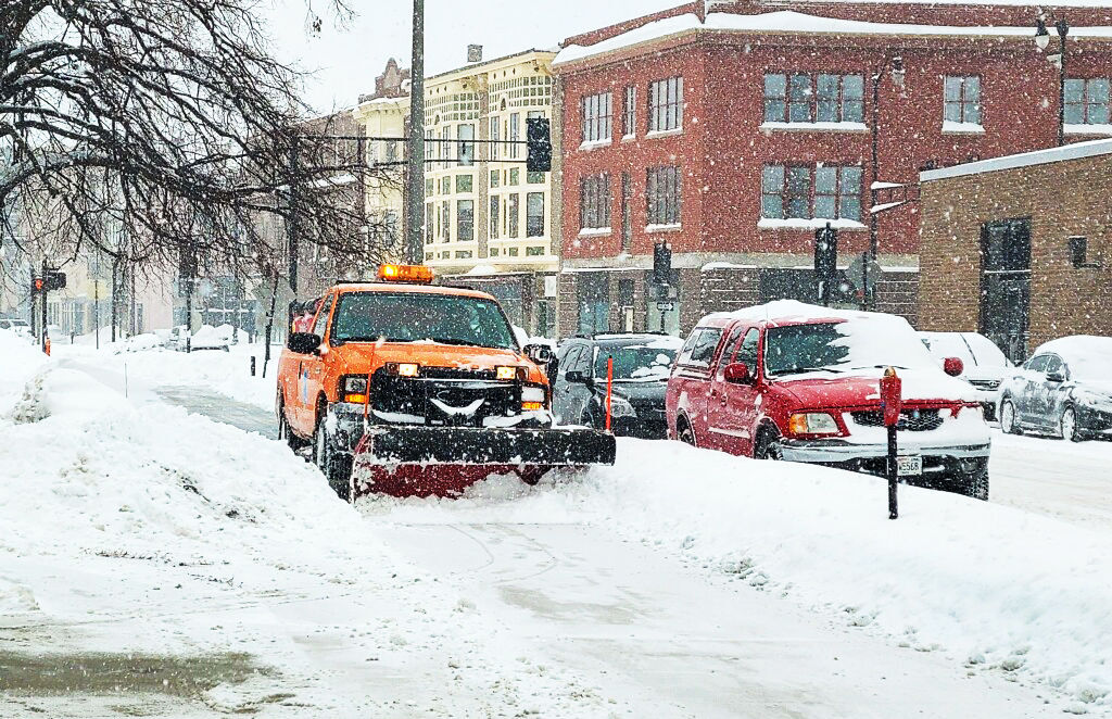 Snowplow on sidewalk